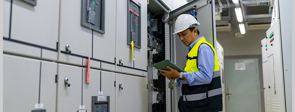 industrial-technician-maintenance-checking-power-system-manufacturing-plant-room